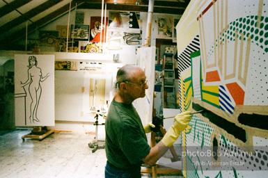 Roy Lichtenstein at work on his Interior with Painting and Still Life. 1997.-photo©Bob Adelman, artwork ©Estate of Roy Lichtenstein