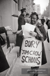 CORE volunteer hands out petition. Brooklyn chapter of the Congress of Racial Equality sit-in at P.S. 200. November, 1962.BE_05-22 001