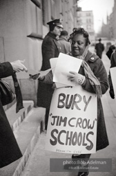 CORE volunteer hands out petition. Brooklyn chapter of the Congress of Racial Equality sit-in at P.S. 200. November, 1962.BE_05-22 001 CORE volunteer hands out petition. Brooklyn chapter of the Congress of Racial Equality sit-in at P.S. 200. November, 1962.BE_05-22 001