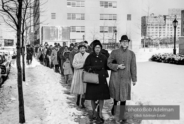 Elaine and Jerome Bibuld lead marchers through the Bedford-Stuyvesant neighboorhoods  protesting unfairness and inequality in the public schools. Brooklyn chapter of the Congress of Racial Equality sit-in at P.S. 200. November, 1962.BE_06-18 001