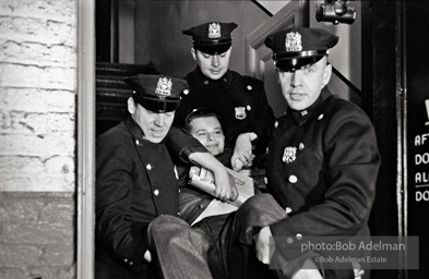 Brooklyn Congress of Racial Equality sit-in against unfair housing policy at Midwood Homes and Westwood Federal savings and loans. Began on Christmas day, 1962. New York City, January, 1963.CORE membe r is forcibly removed by NYC police for attempting to occupy the Ebinger bakery office. demonstrator is protesting unfair hiring practices of the bakery. Brooklyn, 1964.