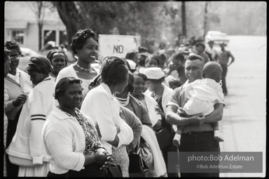 Frank Robinson, CORE field secretary in South Carolina, organized a protest where hundreds of black voters conducted a stand-in to call attention to their inability to register to vote because of lack of staff and the nature of the registration process. Kingstree, SC, March, 1963