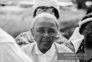 Frank Robinson, CORE field secretary in South Carolina, organized a protest where hundreds of black voters conducted a stand-in to call attention to their inability to register to vote because of lack of staff and the nature of the registration process. Kingstree, SC, March, 1963