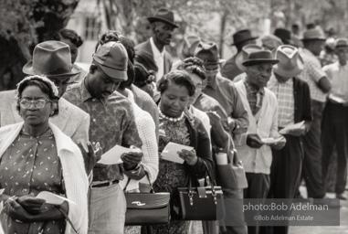 Frank Robinson, CORE field secretary in South Carolina, organized a protest where hundreds of black voters conducted a stand-in to call attention to their inability to register to vote because of lack of staff and the nature of the registration process. Kingstree, SC, March, 1963