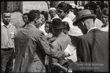 Frank Robinson, CORE field secretary in South Carolina, organized a protest where hundreds of black voters conducted a stand-in to call attention to their inability to register to vote because of lack of staff and the nature of the registration process. Kingstree, SC, March, 1963