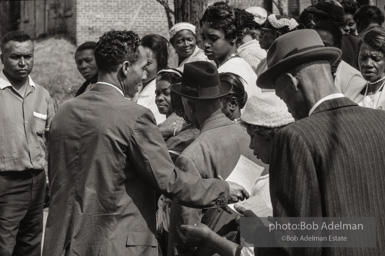 Frank Robinson, CORE field secretary in South Carolina, organized a protest where hundreds of black voters conducted a stand-in to call attention to their inability to register to vote because of lack of staff and the nature of the registration process. Kingstree, SC, March, 1963