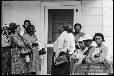 Frank Robinson, CORE field secretary in South Carolina, organized a protest where hundreds of black voters conducted a stand-in to call attention to their inability to register to vote because of lack of staff and the nature of the registration process. Kingstree, SC, March, 1963