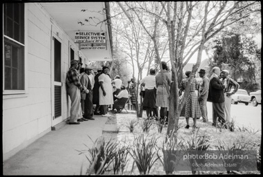 Frank Robinson, CORE field secretary in South Carolina, organized a protest where hundreds of black voters conducted a stand-in to call attention to their inability to register to vote because of lack of staff and the nature of the registration process. Kingstree, SC, March, 1963