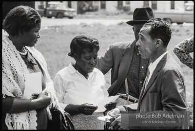 Frank Robinson, CORE field secretary in South Carolina, organized a protest where hundreds of black voters conducted a stand-in to call attention to their inability to register to vote because of lack of staff and the nature of the registration process. Kingstree, SC, March, 1963