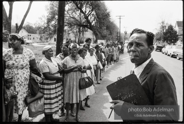 Frank Robinson, CORE field secretary in South Carolina, organized a protest where hundreds of black voters conducted a stand-in to call attention to their inability to register to vote because of lack of staff and the nature of the registration process. Kingstree, SC, March, 1963