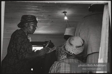 Frank Robinson, CORE field secretary in South Carolina, organized a protest where hundreds of black voters conducted a stand-in to call attention to their inability to register to vote because of lack of staff and the nature of the registration process. Kingstree, SC, March, 1963