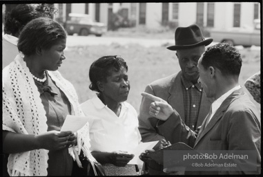 Frank Robinson, CORE field secretary in South Carolina, organized a protest where hundreds of black voters conducted a stand-in to call attention to their inability to register to vote because of lack of staff and the nature of the registration process. Kingstree, SC, March, 1963