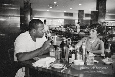 CORE workers eating at integrated restaurant. Loisiana, 1965