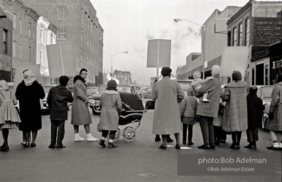 We shall not be moved. Safety first: Parents and children respond to a wave of accidents by blocking their street and demanding the installation of a traffic light, Brooklyn, New York City. January 17, 1963. We shall not be moved. Safety first: Parents and children respond to a wave of accidents by blocking their street and demanding the installation of a traffic light, Brooklyn, New York City. January 17, 1963.