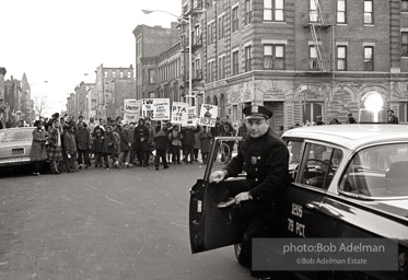 We shall not be moved. Safety first: Parents and children respond to a wave of accidents by blocking their street and demanding the installation of a traffic light, Brooklyn, New York City. January 17, 1963. We shall not be moved. Safety first: Parents and children respond to a wave of accidents by blocking their street and demanding the installation of a traffic light, Brooklyn, New York City. January 17, 1963.