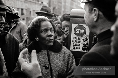 We shall not be moved. Safety first: Parents and children respond to a wave of accidents by blocking their street and demanding the installation of a traffic light,  Brooklyn,  New York City. January 17, 1963.