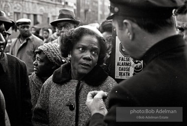 We shall not be moved. Safety first: Parents and children respond to a wave of accidents by blocking their street and demanding the installation of a traffic light,  Brooklyn,  New York City. January 17, 1963.