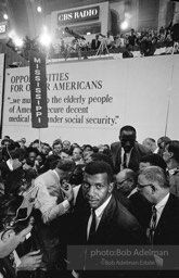 Reporters flock to the Mississippi delegation on the floor of the convention center where members of the Mississippi Freedom Party wish to join an be recognized.Democratic National Convention. Atlantic City,1964.