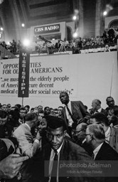 Reporters flock to the Mississippi delegation on the floor of the convention center where members of the Mississippi Freedom Party wish to join an be recognized.Democratic National Convention. Atlantic City,1964.