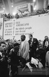 Reporters flock to the Mississippi delegation on the floor of the convention center where members of the Mississippi Freedom Party wish to join an be recognized.Democratic National Convention. Atlantic City,1964.