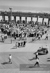 On the boardwalk in Atlantic City, New Jersey, Students gather outside the Democratic National Convention in support for the Mississippi Freedom Democratic Party.1964.