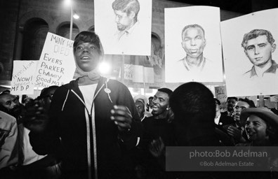 Nighttime demonstration in support of the Mississippi Freedom Democratic Party, with images of slain civil rights workers Schwerner, Chaney and Goodman, Atlantic City, NJ 1964