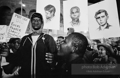 Nighttime demonstration in support of the Mississippi Freedom Democratic Party, with images of slain civil rights workers Schwerner, Chaney and Goodman, Atlantic City, NJ 1964