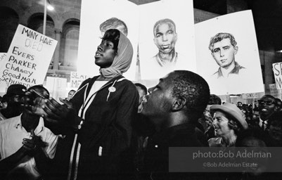 Nighttime demonstration in support of the Mississippi Freedom Democratic Party, with images of slain civil rights workers Schwerner, Chaney and Goodman, Atlantic City, NJ 1964