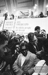 Reporters flock to the Mississippi delegation on the floor of the convention center where members of the Mississippi Freedom Party wish to join an be recognized.Democratic National Convention. Atlantic City,1964.