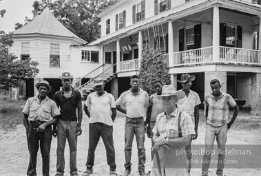Mr. Marsh Tait with plantation workers. Opossum Bend, 1965. photo:©Bob Adelman, from the book DOWN HOME by Bob Adelman and Susan Hall.
