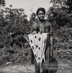 Selling voter registration banners. Camden, 1965. photo:©Bob Adelman, from the book DOWN HOME by Bob Adelman and Susan Hall.