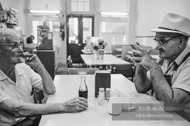 Mr. Arthur Logue and Mr. Les King. The Old Camden Cafe. Camden, 1965. photo:©Bob Adelman, from the book DOWN HOME by Bob Adelman and Susan Hall.