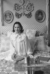 Gloria Vanderbilt poses in a peignoir with a hair brush not disimilar to the one featured in her new erotic novel. New York City, 1980.