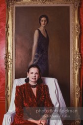 Gloria Vanderbilt in her upper east side New York apartment poses under a portrait of her mother, Gloria Laura Mercedes Morgan-Vanderbilt. In a sensational legal battle her mother lost custody of her daughter Gloria. New York City, 1980.