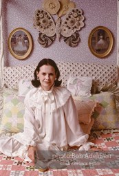 Gloria Vanderbilt poses in a peignoir with a hair brush not disimilar to the one featured in her new erotic novel. New York City, 1980.