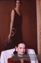 Gloria Vanderbilt in her upper east side New York apartment poses under a portrait of her mother, Gloria Laura Mercedes Morgan-Vanderbilt. In a sensational legal battle her mother lost custody of her daughter Gloria. New York City, 1980.