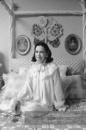 Gloria Vanderbilt poses in a peignoir with a hair brush not disimilar to the one featured in her new erotic novel. New York City, 1980.