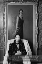 Gloria Vanderbilt in her upper east side New York apartment poses under a portrait of her mother, Gloria Laura Mercedes Morgan-Vanderbilt. In a sensational legal battle her mother lost custody of her daughter Gloria. New York City, 1980.