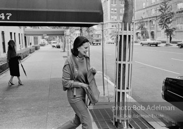 Gloria Vanderbilt on the street in front of her apartment house, New York City, 1980