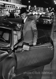 Silky enters his car at kennedy Airport where he had gone to pick up Sandy. She was returning from a month of work in Puerto Rico. New York City, 1970. photo:©Bob Adelman. From the book Gentleman of Leisure by Susan Hall and Bob Adelman.