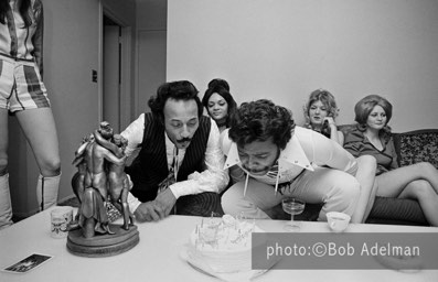 Dandy and Silky blow out the candles. They share the same birthday. - New York City, 1970. photo:©Bob Adelman. From the book Gentleman of Leisure by Susan Hall and Bob Adelman.