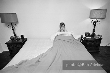 Lois in bed at Linda's apartment. - New York City, 1970. photo:©Bob Adelman. From the book Gentleman of Leisure by Susan Hall and Bob Adelman.