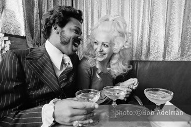 Silky and Sandy drink champagne at a nightclub. New York City, 1970. photo:©Bob Adelman. From the book Gentleman of Leisure by Susan Hall and Bob Adelman.