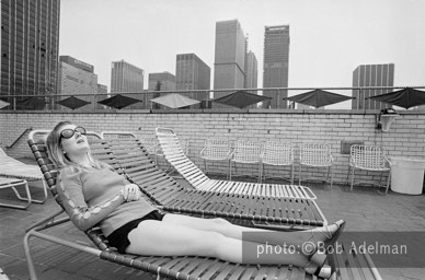 Lois lounging at a motel pool after leaving Silky. - New York City, 1970. photo:©Bob Adelman. From the book Gentleman of Leisure by Susan Hall and Bob Adelman.