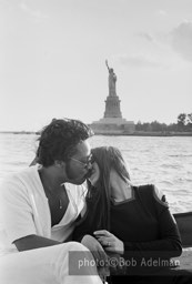 Linda and Silky embrace with the Statue of Liberty in the background. - New York City, 1970. photo:©Bob Adelman. From the book Gentleman of Leisure by Susan Hall and Bob Adelman.
