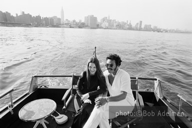 Linda and Silky go for a ride on George's boat. The New York skyline is in the background. - New York City, 1970. photo:©Bob Adelman. From the book Gentleman of Leisure by Susan Hall and Bob Adelman.