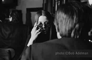 Linda talking to a potential client in a bar. - New York City, 1970. photo:©Bob Adelman. From the book Gentleman of Leisure by Susan Hall and Bob Adelman.