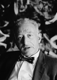 Adolph Gottlieb photographed in front of his painting Groundscape (1956) New York, NY mid-1960s. Adolph Gottlieb photographed in front of his painting Groundscape (1956) New York, NY mid-1960s.