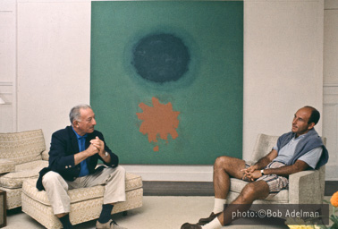 Adolph Gottlieb with collector Ben Heller at Gottlieb's home in East Hampton, NY, 1964.  They are sitting in front of Petaloid #2 (1963)-photo:©Bob Adelman/Artwork:©Adolph and Esther Gottlieb Foundation