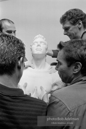 Artist Jeff Koons assists during the installation of his Artist Jeff Koons assists during the installation of his